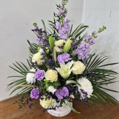 Lilac Hat box - These beautiful arranged hat boxes are set in oasis perfect for display at home or for a special occasion 