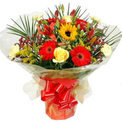 Vibrant Handtied - Vibrant Handtied of mixed flowers arranged by the florist.